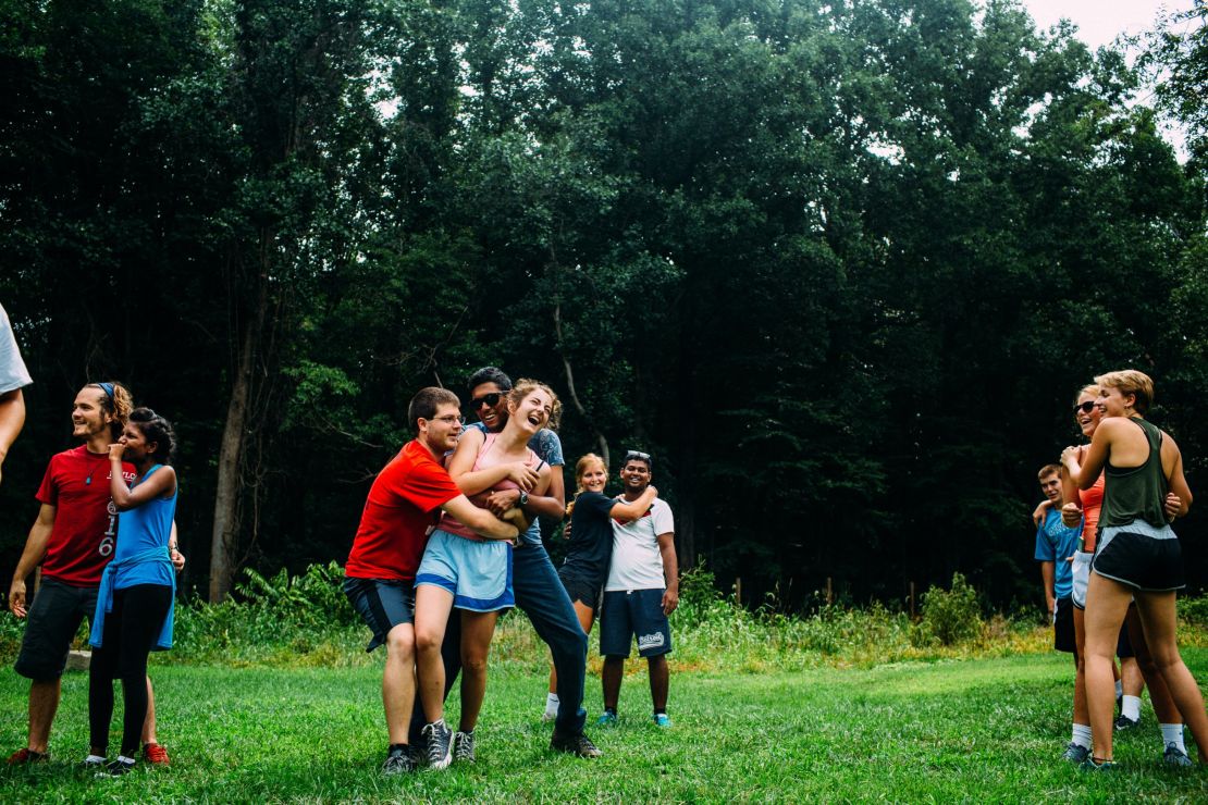 Campers and counselors play the Person-to-Person trust-building exercise at Outward Bound.