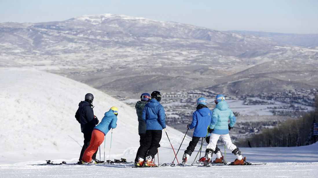 Winter or summer, Park City is the center of a booming tourism industry. In the warmer months, there's biking and hiking. When snow falls, skiers like this group head to Park City Mountain Resort.