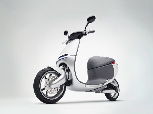 Luke's electric two-wheel scooter runs on swappable modular batteries, accessed via battery vending machines and charging points.