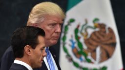 US presidential candidate Donald Trump (R) and Mexican President Enrique Pena Nieto prepare to deliver a joint press conference in Mexico City on August 31, 2016.
Donald Trump was expected in Mexico Wednesday to meet its president, in a move aimed at showing that despite the Republican White House hopeful's hardline opposition to illegal immigration he is no close-minded xenophobe. Trump stunned the political establishment when he announced late Tuesday that he was making the surprise trip south of the border to meet with President Enrique Pena Nieto, a sharp Trump critic.
 / AFP / YURI CORTEZ        (Photo credit should read YURI CORTEZ/AFP/Getty Images)