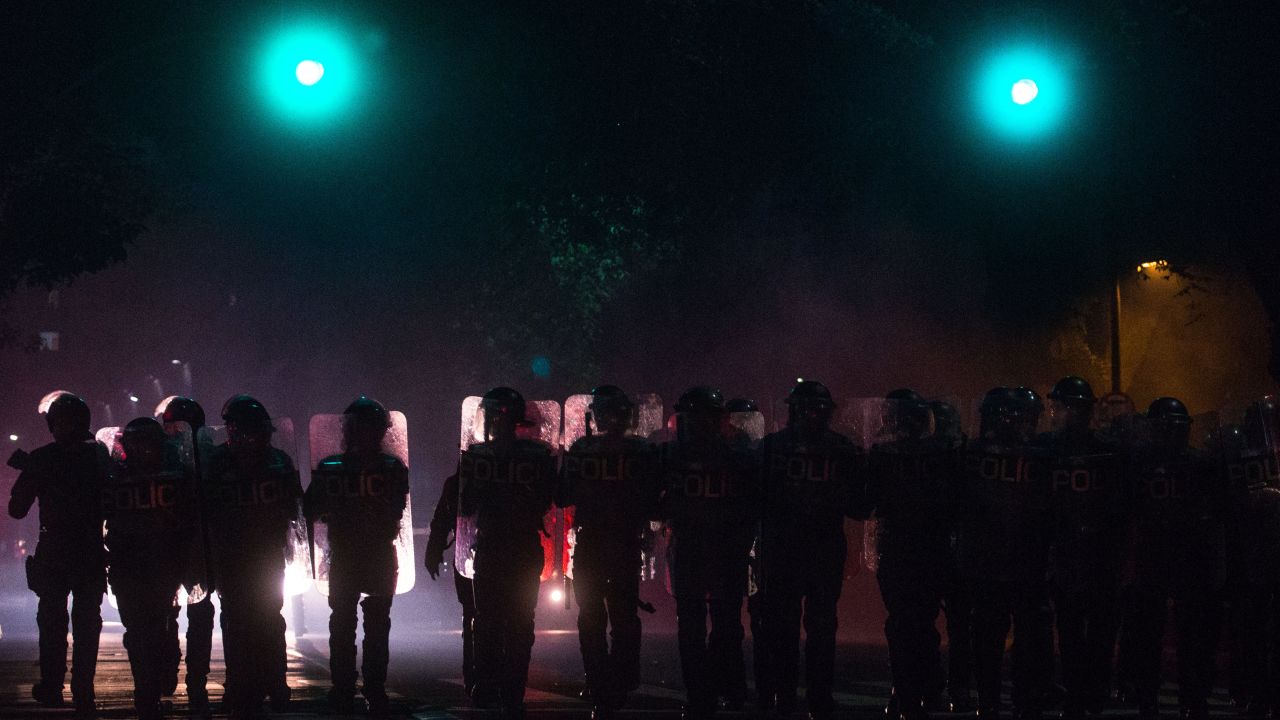 Police line the streets during a protest march of supporters of ex-President Dilma Rousseff in Sao Paulo.