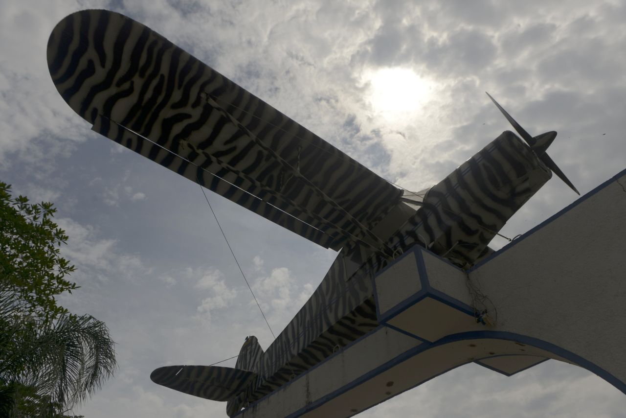The Colombian single-engine airplane Escobar used to send his first cocaine shipment to the United States was incorporated into the park's entrance.