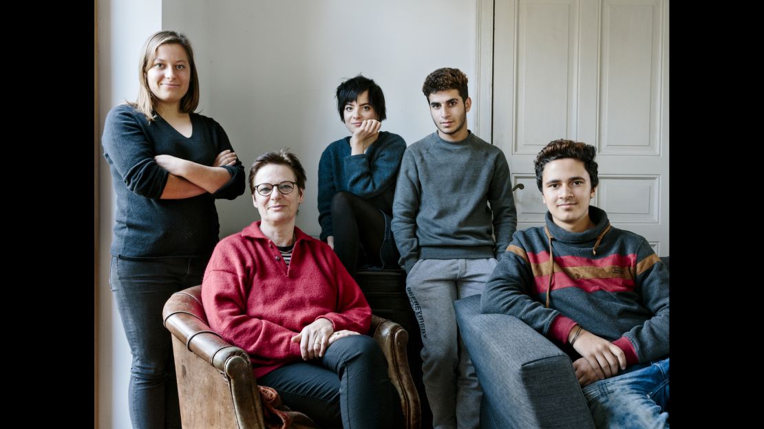 Sabine Waldner with twins Charlotte and Miriam, and Juan and Mohammed, the two Syrian boys they share their home with.