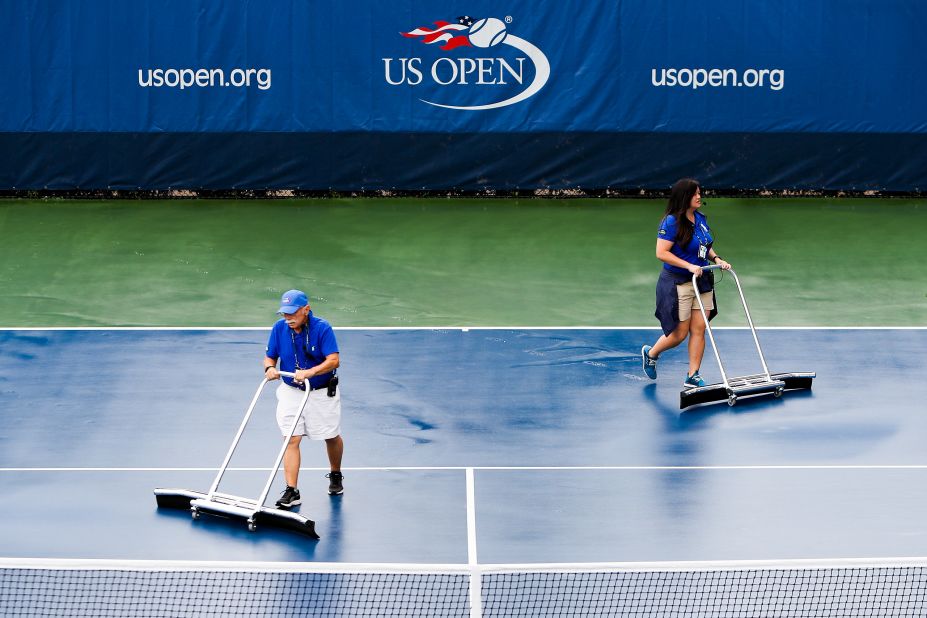 Rain hit New York on Thursday, which made for unplayable outer courts for a time. But thankfully there was a roof over center court this year ...