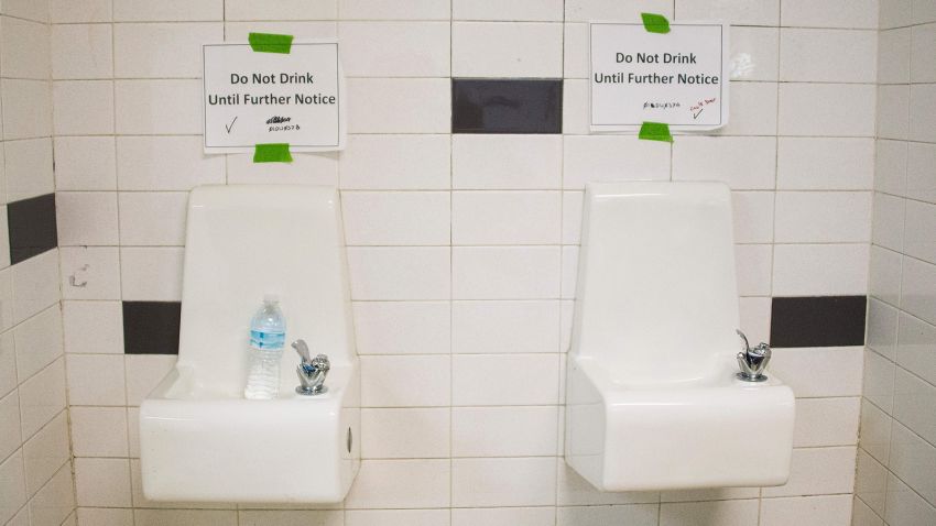 Placards posted above water fountains warn against drinking the water at Flint Northwestern High School in Flint, Michigan, May 4, 2016.