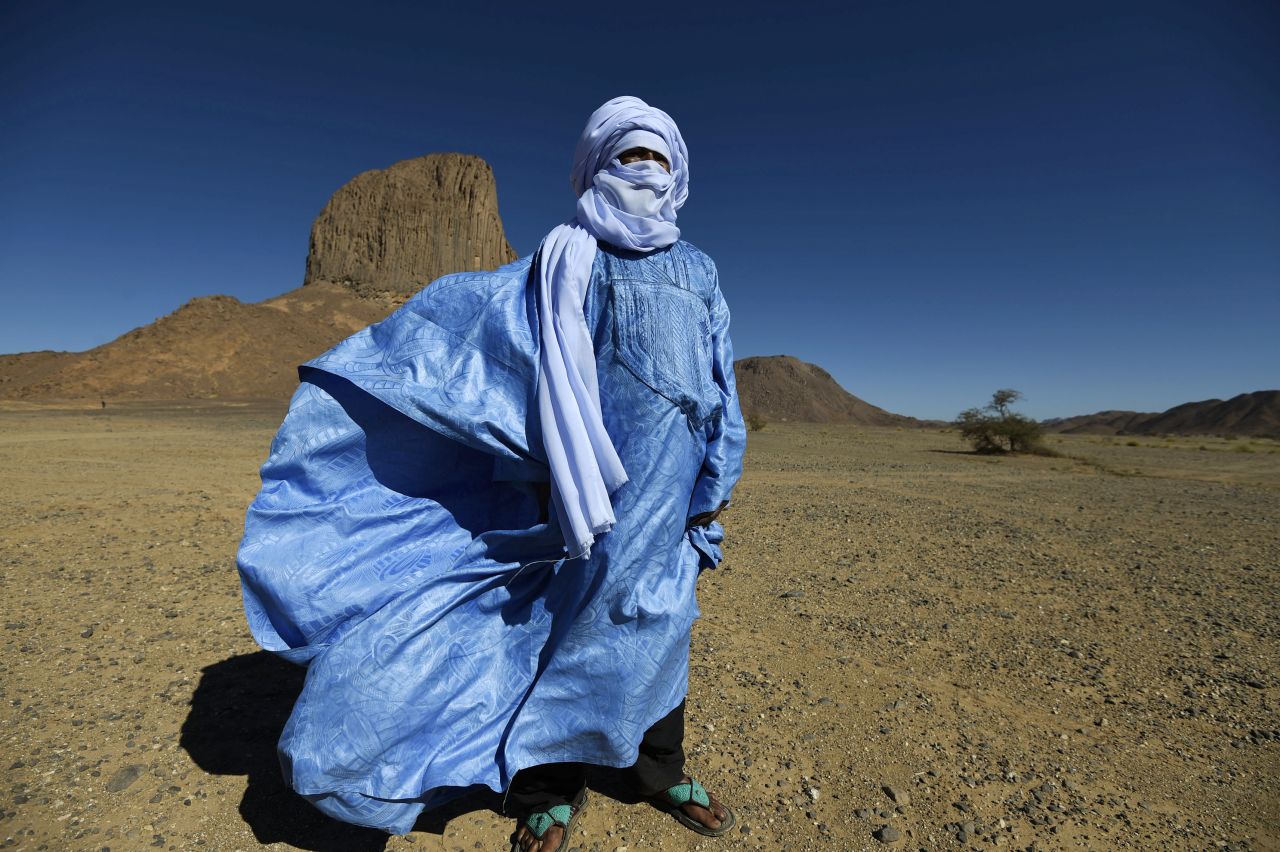 Author Nicholas Jubber experienced the precarious life faced by the Sahara's nomadic peoples, recording them in new book "The Timbuktu School for Nomads: Across the Sahara in the Shadow of Jihad." Pictured, a Tuareg poet in a blue robe in southern Algeria, 2016. 