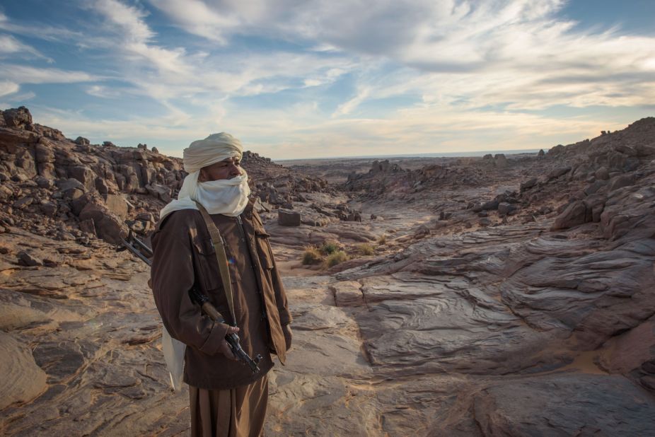 Political instability in Libya spread south in 2012, with Islamic militants waging war on parts of Mali, claiming Timbuktu in and derailing Jubber's journey. Pictured, a Tuareg tribesman looks on in the Meggedat valley, Libya. 