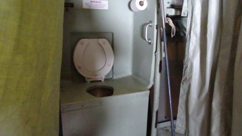 Semi-private facilities aboard an Air Force Hurricane Hunter plane.