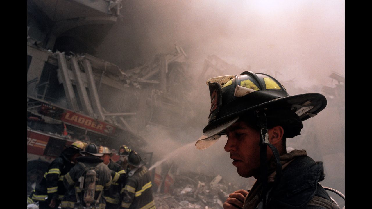 Of the 2,753 people who perished in New York, 343 were firefighters, 23 were police officers and 37 were officers with the Port Authority. (Gilles Peres) 