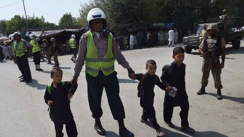 Pakistani soldiers cordon off a street leading to the Christian neighborhood on the outskirts of Peshawar.