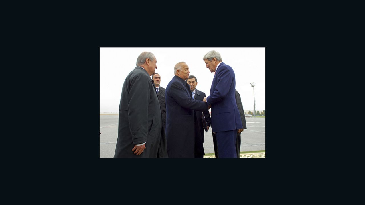 U.S. Secretary of State John Kerry is greeted by Uzbekistan President Islam Karimov on November 1, 2015