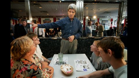 Kerry meets locals in a diner in Derry, New Hampshire, shortly after announcing his 2004 candidacy for president. Kerry would win the Democratic nomination, but lose the general election to President George W. Bush.