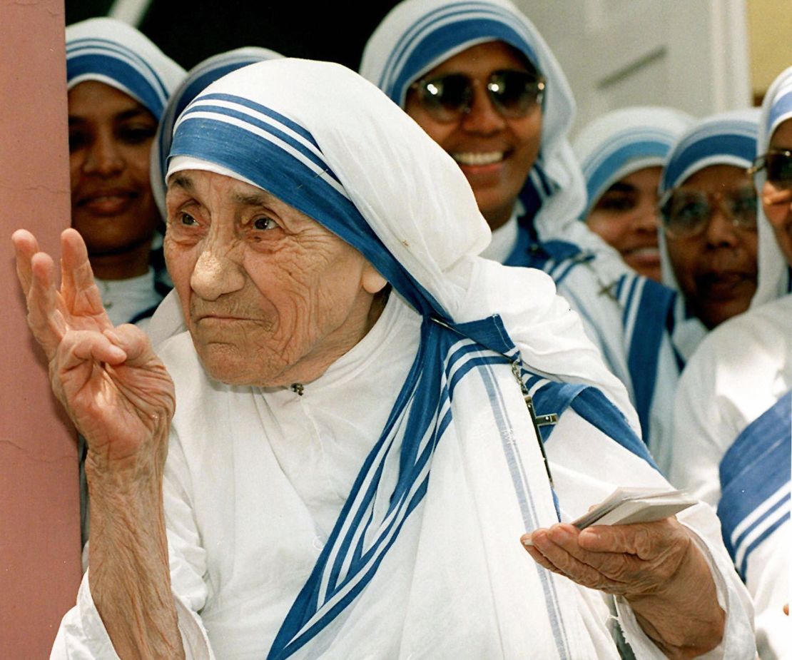 Mother Teresa stands with nuns of the Missionaries of Charity For Destitute Children in New Delhi in this file photo taken in 1997