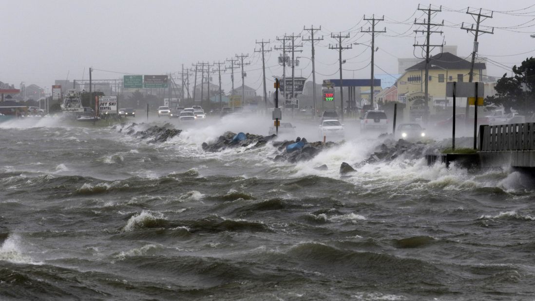 Water from Roanoke Sound pounds the Virginia Dare Trail in Manteo, North Carolina, September 3 as Tropical Storm Hermine passes the Outer Banks.