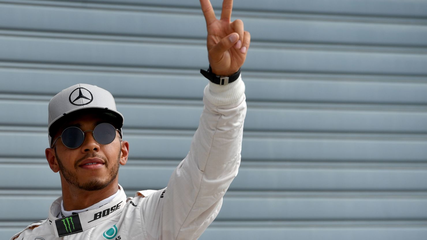 Lewis Hamilton celebrates claiming pole position at Monza.