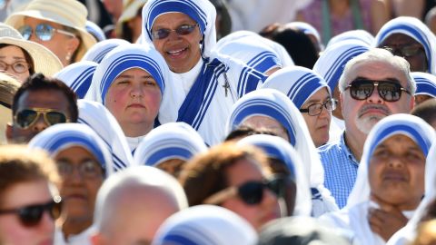 Nuns of the Missionaries of Charity wait in St. Peter's Square.