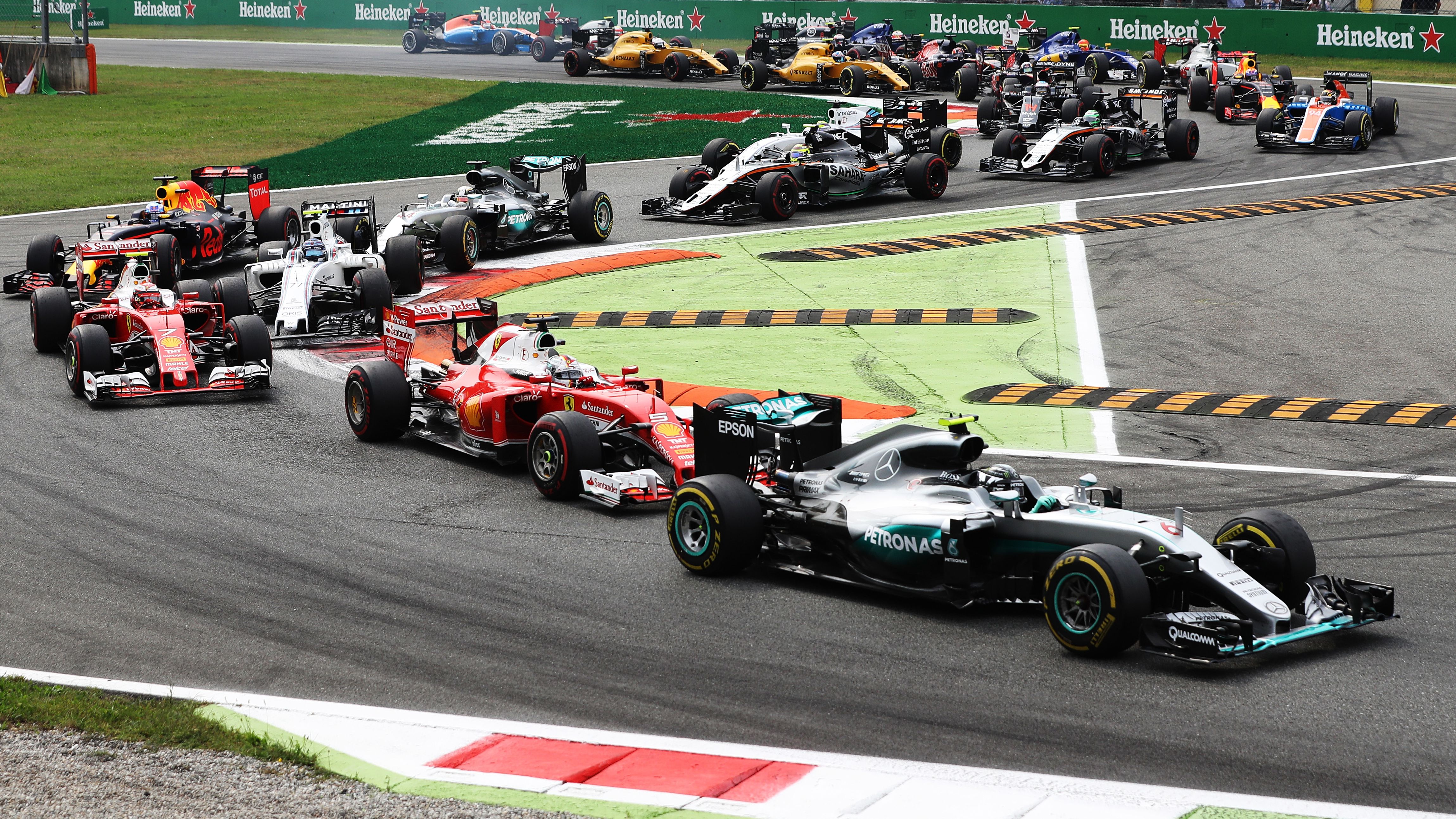 Nico Rosberg leads the Italian Grand Prix at the start after a slow get away by Mercedes team mate Lewis Hamilton.