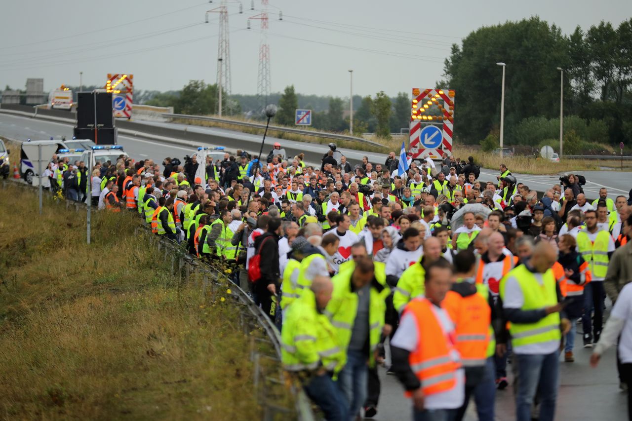 French business owners and local residents block the main road into the Port of Calais as they protest "The Jungle" on Monday, September 5.