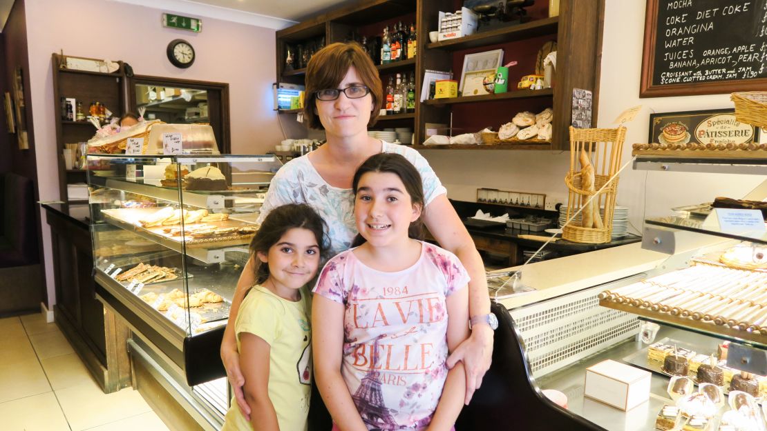 "A lot of people were waving their badges, which said 'Leave,'" said Helen Hezeques, pictured with her children.