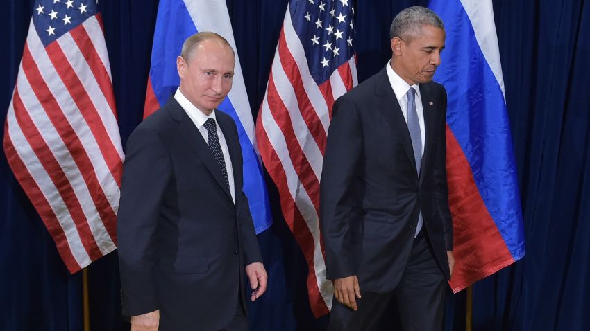 US President Barack Obama and Russia's President Vladimir Putin leave after posing for a photo ahead of a bilateral meeting on the sidelines of the 70th session of the UN General Assembly at the United Nations headquarters on September 28, 2015 in New York. AFP PHOTO/MANDEL NGAN (Photo credit should read MANDEL NGAN/AFP/Getty Images)
