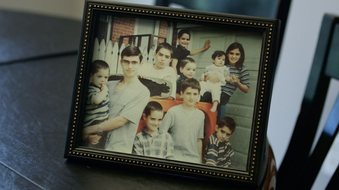 The Palombo 10 in 2000. From left, in front: Anthony holding Stephen, Tommy, Joe and John. Behind them is Frank (with skateboard), Daniel and Maria holding Maggie. Patrick is in back.