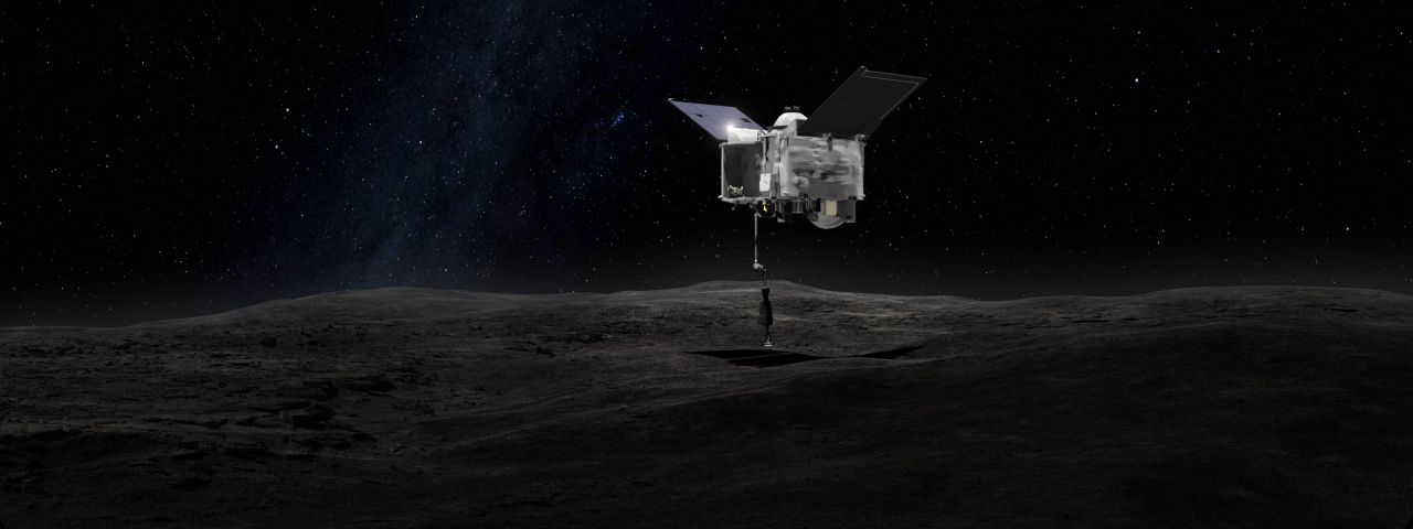 This drawing shows an artist's concept of what it will look like when the OSIRIS-REx spacecraft briefly touches asteroid Bennu with its robot arm to grab a sample of the asteroid.