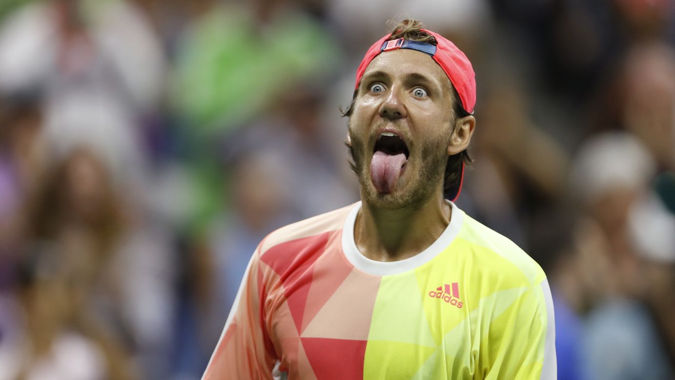 Lucas Pouille reacts after <a href="http://www.cnn.com/2016/09/04/tennis/tennis-open-upset/" target="_blank">defeating two-time U.S. Open champion Rafael Nadal</a> in a match in New York on Sunday, September 4.