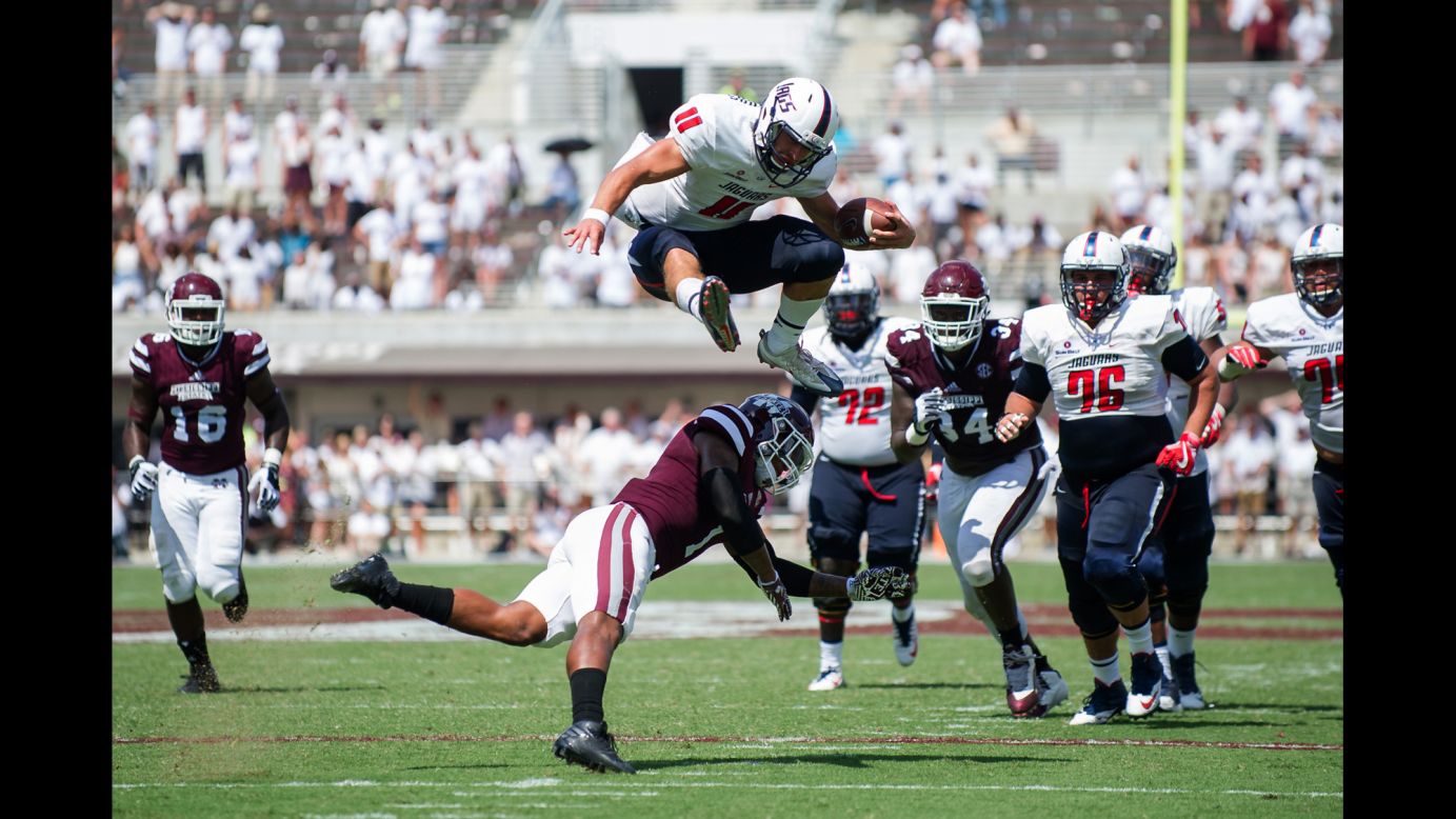 Dallas Davis of South Alabama leaps over Mississippi State's Brandon Bryant during a game in Starkville, Mississippi, on Saturday, September 3. Mississippi State lost by just one point, 20-21.