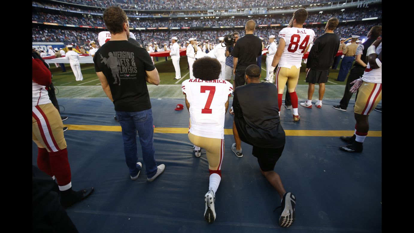 Colin Kaepernick, left, and Eric Reid of San Francisco kneel during the national anthem before a game in San Diego on Thursday, September 1. Kaepernick has said <a href="http://edition.cnn.com/2016/09/01/sport/nfl-preseason-49ers-chargers-colin-kaepernick-national-anthem/" target="_blank">he would refuse to stand during the national anthem</a> because he will not "show pride in a flag for a country that oppresses black people and people of color."