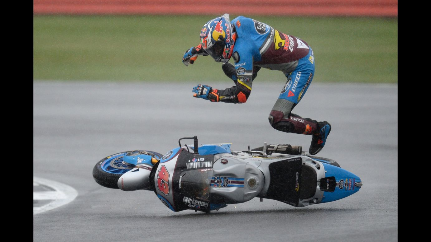 Jack Miller is thrown off his motorcycle during a British Grand Prix qualifying race in Northamptonshire, England, on Saturday, September 3.