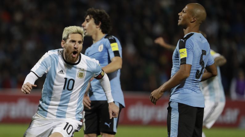 Argentine soccer star Lionel Messi, left, celebrates scoring against Uruguay during a World Cup 2018 qualifying match in Mendoza, Argentina, on Thursday, September 1. Argentina won 1-0.