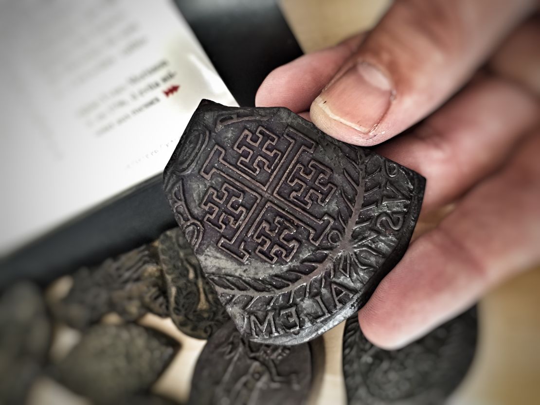 500-year-old tattoo wood block stencil of the Jerusalem Cross