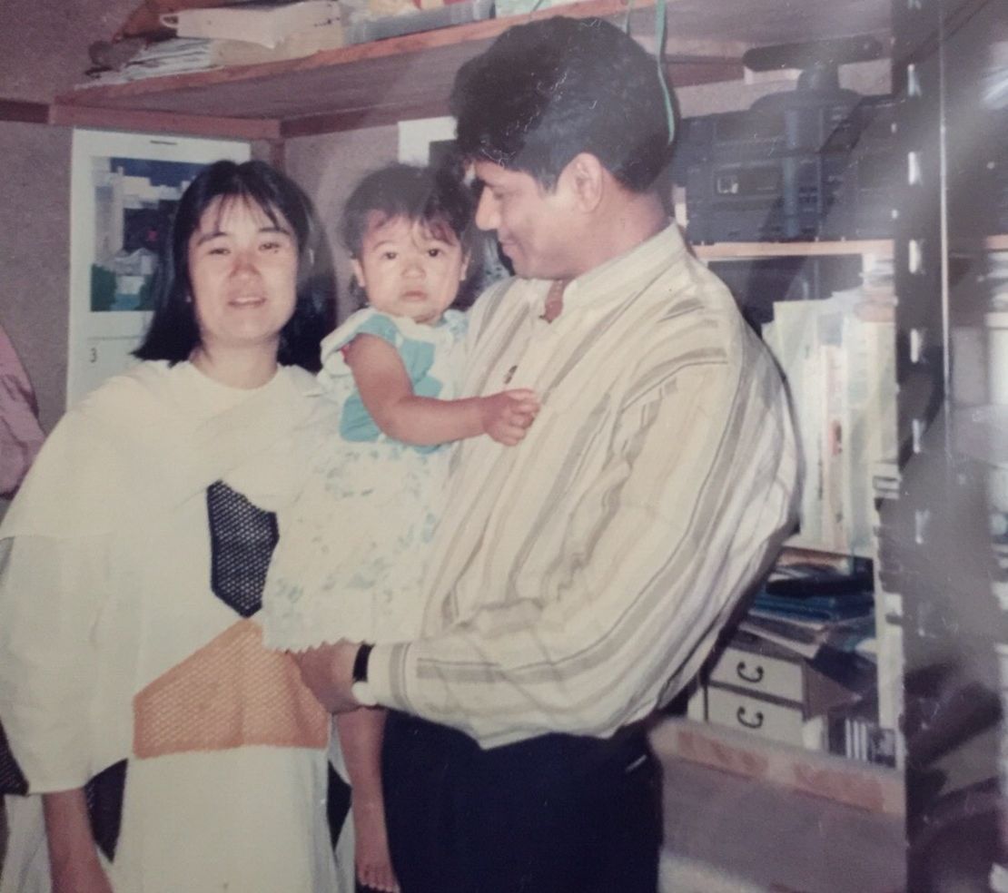 Priyanka Yoshikawa with her parents as a toddler.