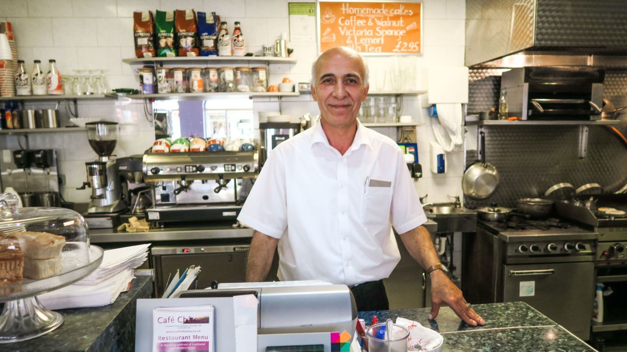 Turkish cafe owner Osal Bertiz, 53, has lived in the UK for 13 years. His staff includes four Romanians, three Turks and a Lithuanian. 