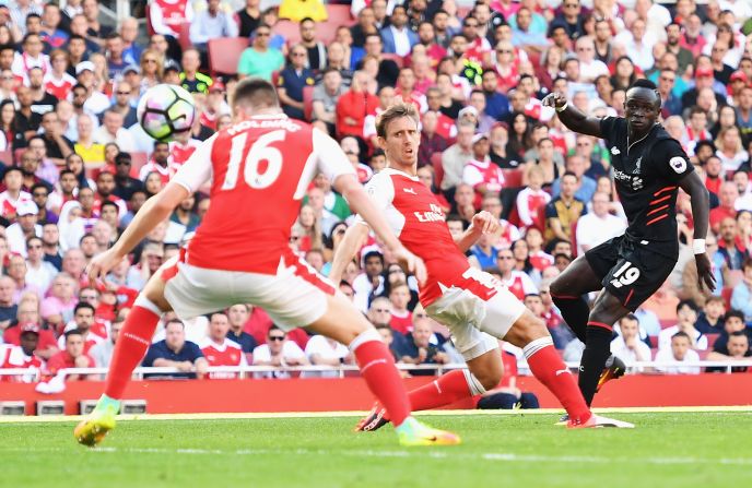 The academy has produced many stars such as Liverpool's Sadio Mane, seen here scoring against Arsenal.  