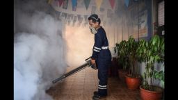 A pest control worker fumigates a school corridor on the eve of the annual national Primary School Evaluation Test in Kuala Lumpur on September 4, 2016. Malaysia reported its first locally transmitted Zika case on September 3, a 61-year-old man who has died of heart-related complications, the government said. / AFP / MOHD RASFAN        (Photo credit should read MOHD RASFAN/AFP/Getty Images)