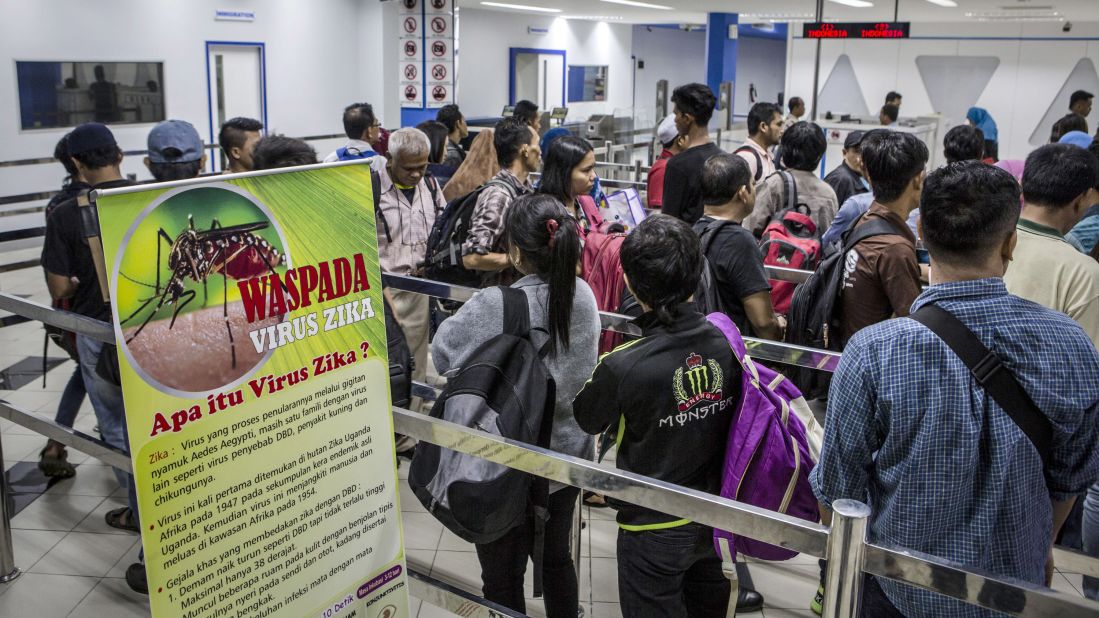 A banner about Zika virus is seen as ferry passengers <a href="http://www.cnn.com/2016/09/05/health/zika-asia-threat/" target="_blank">arriving from Singapore</a> get in line at the immigration check on September 4, in Batam, Indonesia. 