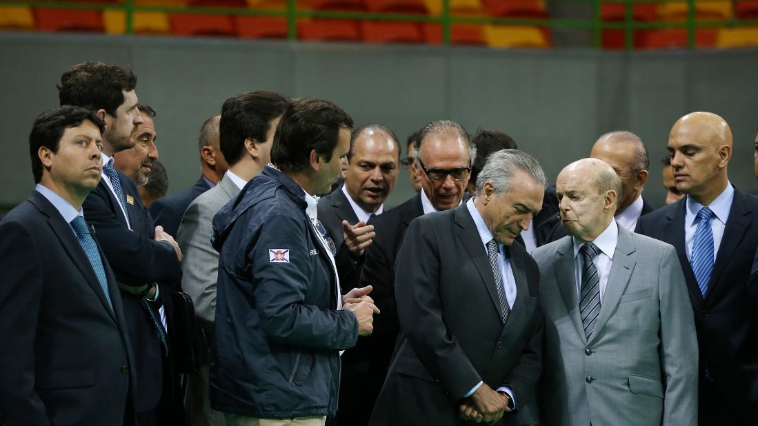 Brazil's interim President Michel Temer, center right, meets with officials during Temer's first visit to the Olympic Park on Thursday, June 14, in Rio de Janeiro. The Rio 2016 Olympic Games commence August 5 amid a political and economic crisis in the country along with the Zika virus outbreak.  
