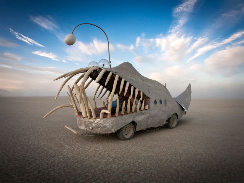 Photographer Scott London has spent over a decade documenting the Burning Man festival, held annually in Nevada's Black Rock Desert. One of his main subjects is capturing the event's bizzare Mutant Vehicles. Scroll through the gallery to see and read his thoughts about each art car he photographed. <br /><br />"Anglerfish are deep-ocean creatures with razor sharp teeth and luminescent lures hanging in front of their jaws to attract prey. It's a recurring motif at Burning Man. This fearsome-looking vehicle was created by Northern California metal artist Mark Whitman."