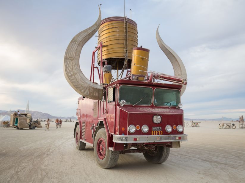 "With its massive glowing horns and dazzling flame-throwing effects, Heathen is one of the more easily-recognized art cars at Burning Man. Yet it's actually one of artist Kirk Strawn's lesser known vehicles. His other art cars include the giant VW bus 'Walter' and the<br />oversized Beetle 'Big Red.'"