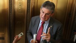 Sen. Joe Manchin (R-WV) talks to reporters after attending a Senate bipartisan lunch in the Russell Senate Office Building on Capitol Hill February 4, 2015 in Washington, DC.