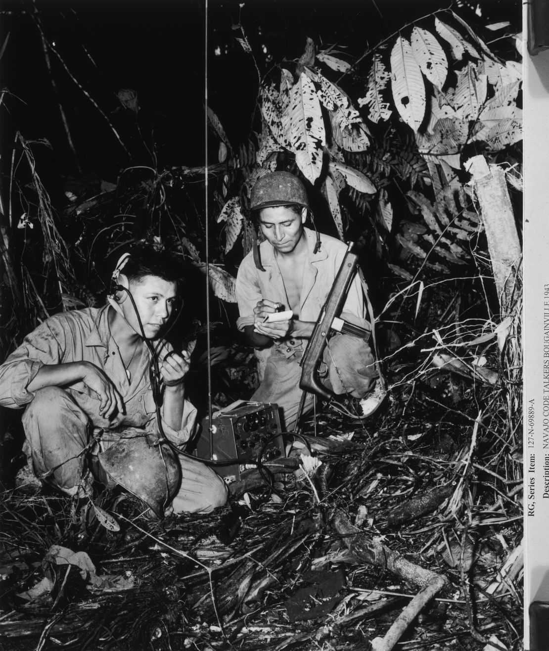 A photograph of Navajo Code Talkers, Cpl Henry Bake, Jr. and PFC George H. Kirk in Bougainville, circa 1943.