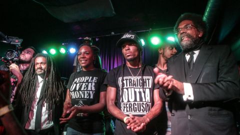Darren Seals, second from right, appears with fellow activists, from left, the Rev. Osagyefo Sekou, Bree Newsome and Dr. Cornel West during a benefit hip-hop concert in St. Louis last year.