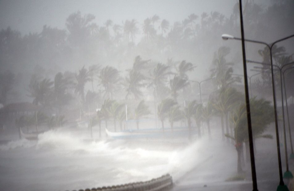 Typhoon Hagupit's violent wind and rain pound the seawall, before passing through the city of Legazpi in 2014.