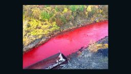 Authorities in Russia are trying to determine why the waters of the Daldykan River in Siberia have suddenly turned bright red.
