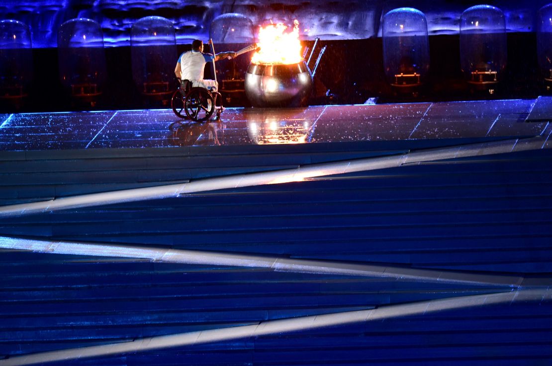 Clodoaldo Silva lights the cauldron at the opening ceremony