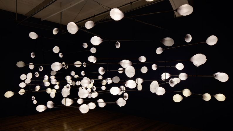 The Vienna-based design studio mischer'traxler (Katharina Mischer and Thomas Traxler) created a kinetic light installation, LeveL: the fragile balance of utopia, which is fully illuminated when still, and dims with movement. <br />