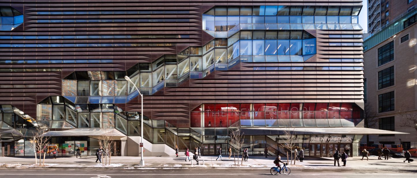 This extraordinarily complex building features a mix of multi-use spaces that include performance venues, social spaces, teaching and learning areas and student housing. The three major staircases in the base block weave through the floors, animating each street edge as they reveal student life within.