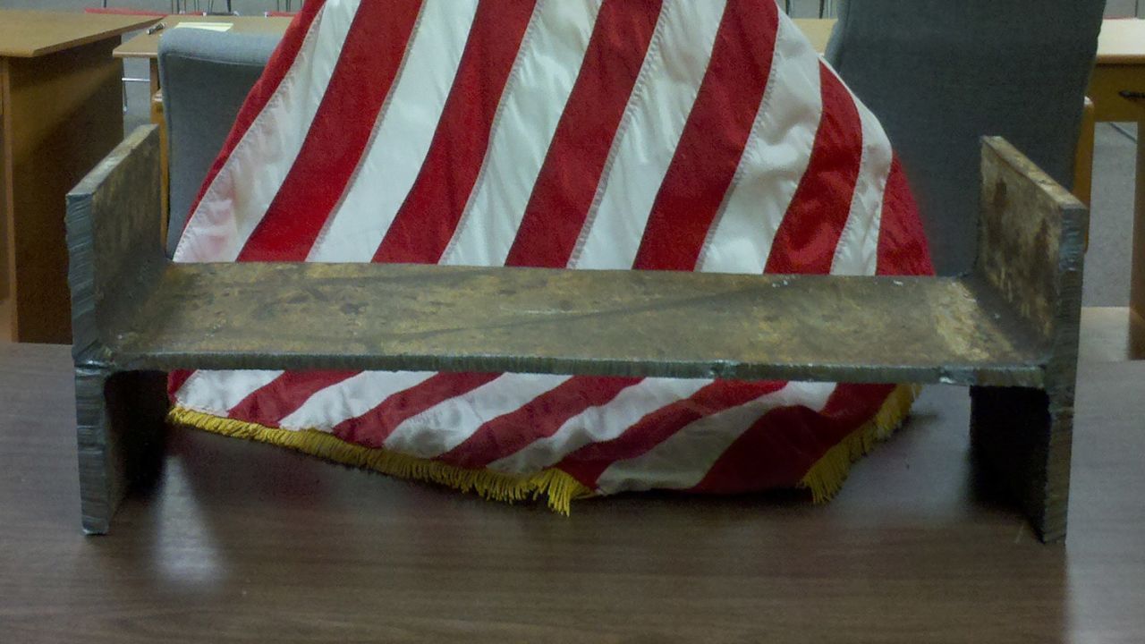 The piece of steel, which was part of the World Trade Center.
