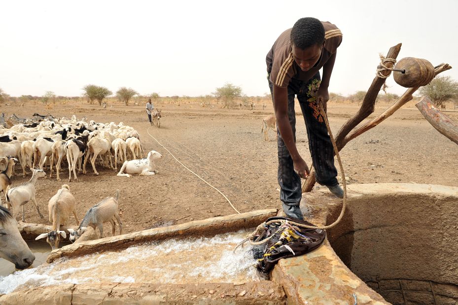 A Bedouin takes water from a well near Nema, southeastern Mauritania, 2012. The West African nation has retained one cultural trait that was dominant during the time of Mansa Musa I: slavery (<a href="http://edition.cnn.com/interactive/2012/03/world/mauritania.slaverys.last.stronghold/">which is illegal, but widespread)</a>. Jubber writes of his hopes that "the future will be very different," and the region will regain its great wealth from sources such as solar energy instead.